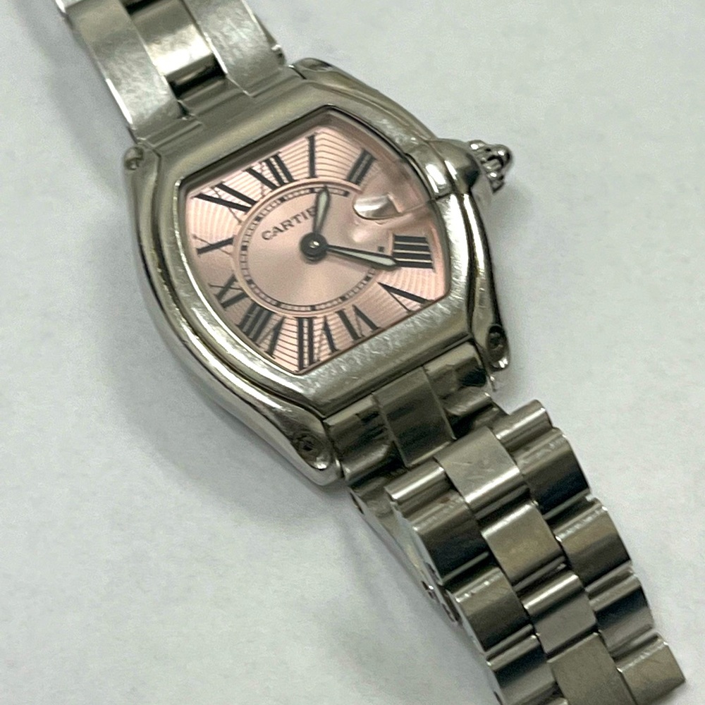 Cartier Roadster watch with pink face